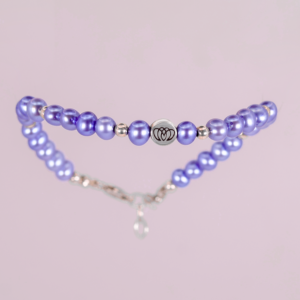Brazalete modelo único con perlas moradas y detalles en plata 925Brazalete modelo único con perlas moradas y detalles en plata 925