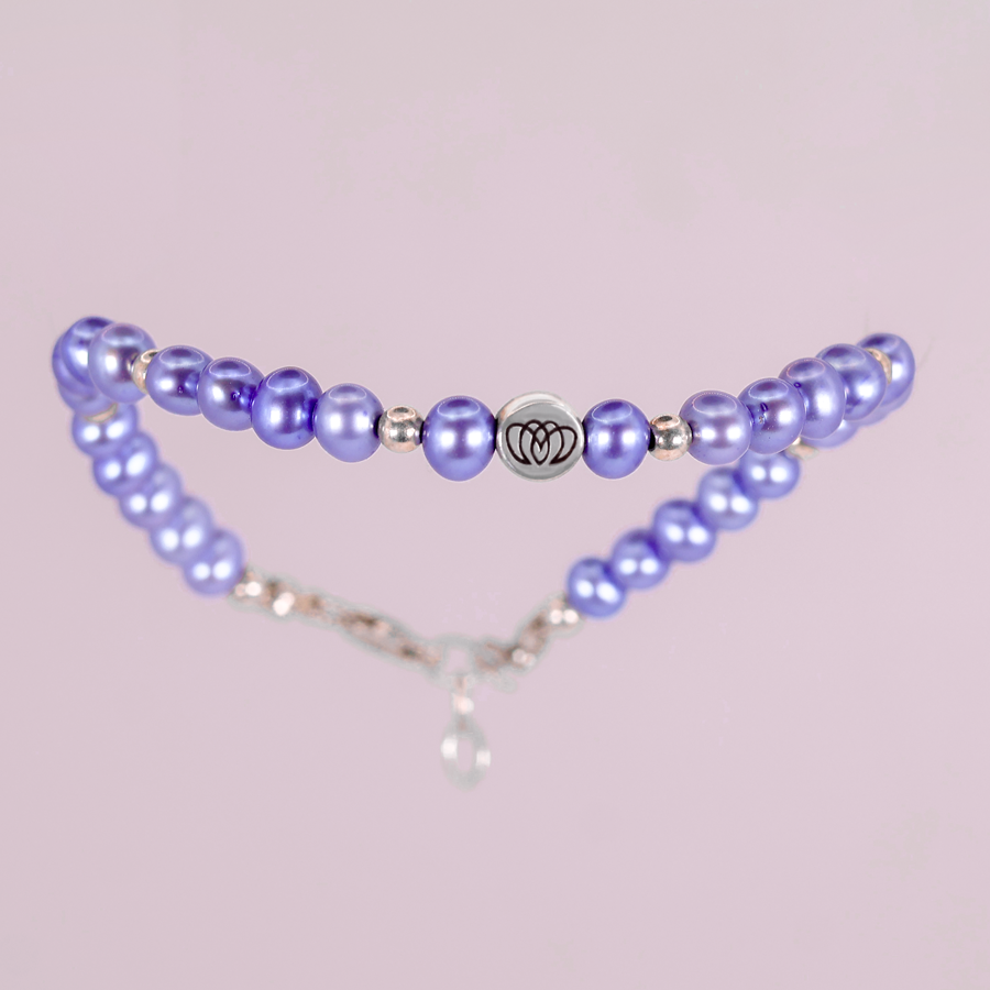 Brazalete modelo único con perlas moradas y detalles en plata 925Brazalete modelo único con perlas moradas y detalles en plata 925