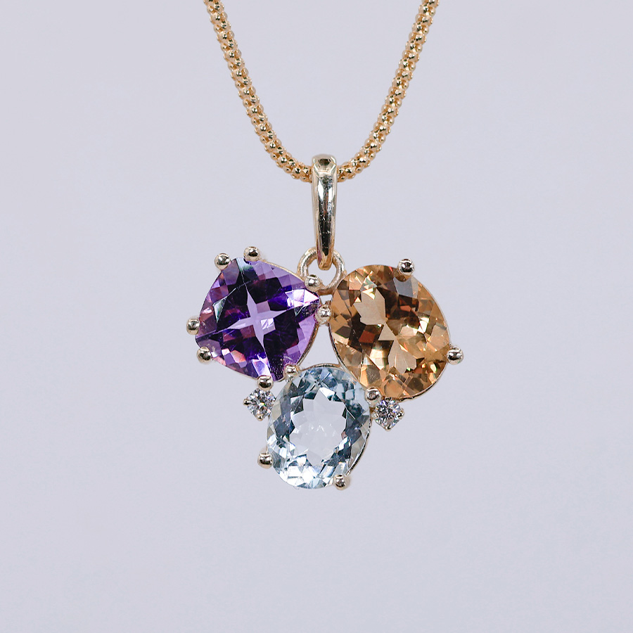 dije de amatista aguamarina y morganita en oro 14k