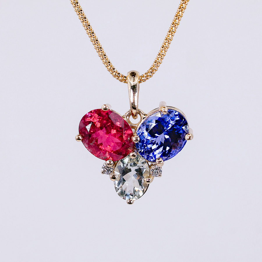 dije de tanzanita morganita y amatista en oro 14k