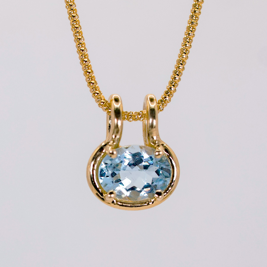 dije de aguamarina oval en oro 14k