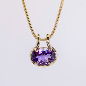 dije de amatista oval en oro 14k